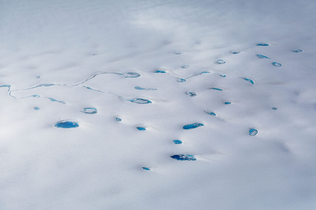 Glacial pools and streams on ice field