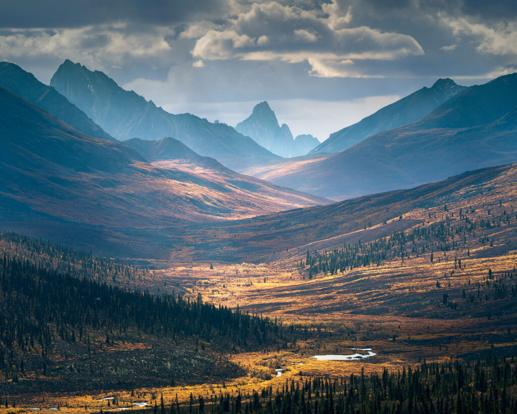 tombstone mountain under passing clouds