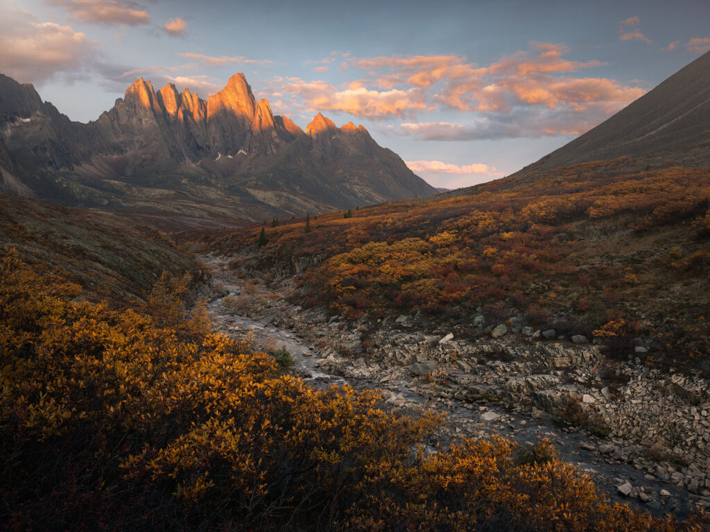 sunrise over tombstone mountain in fall