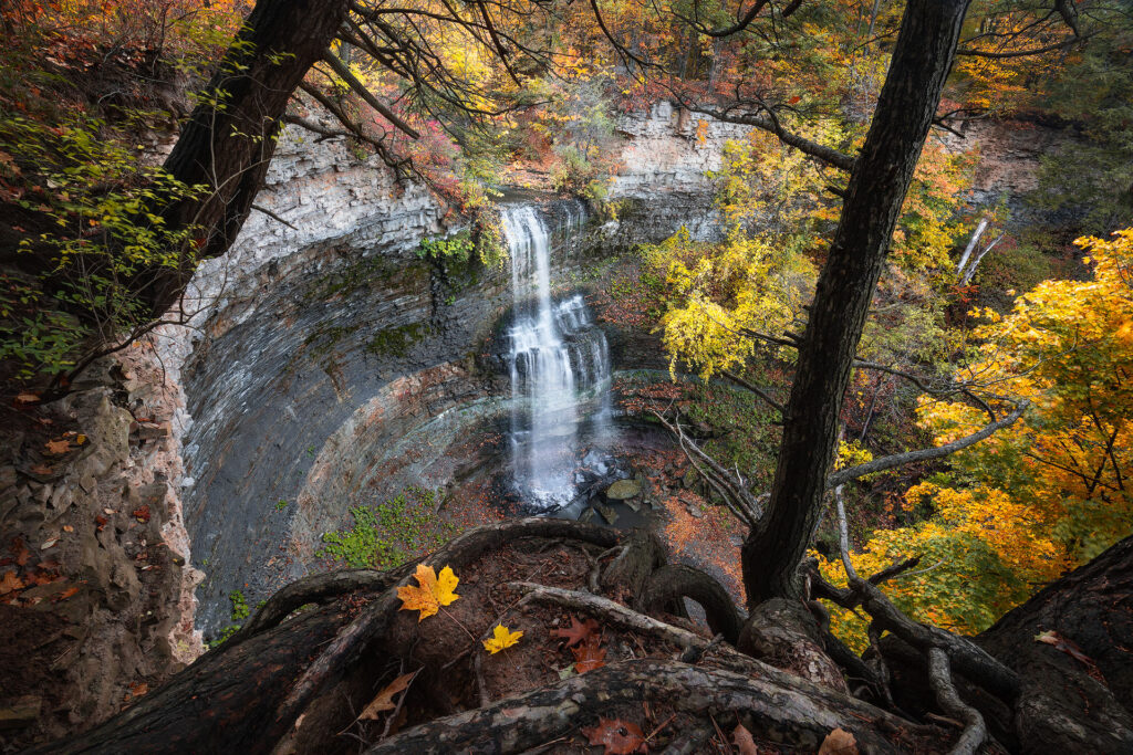 waterfall over tall cliff during fall