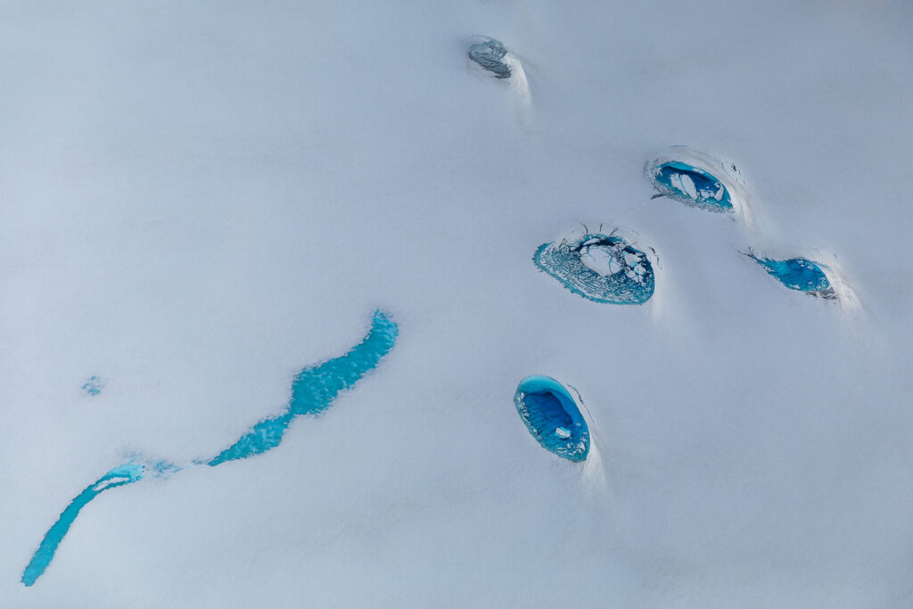 Glacial pools and streams on ice field