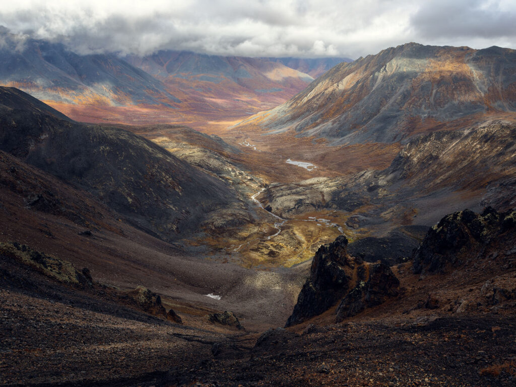 fall colour over mountain valley