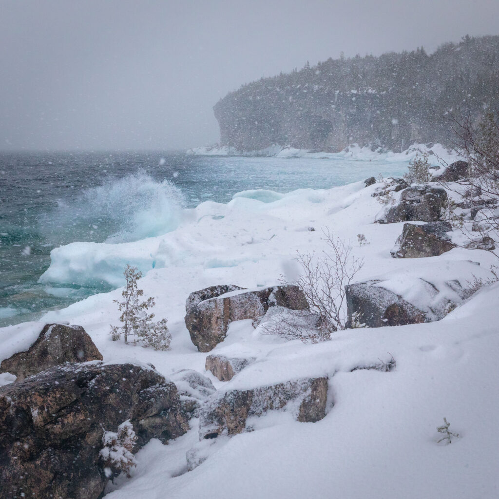 snowstorm over cliffs above lake Huron in Bruce Peninsula National Park