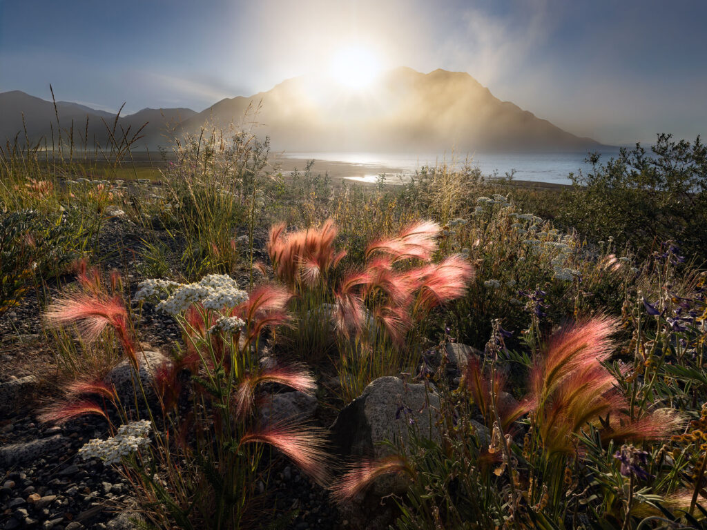 Sunset over dust storm mountain and northern grasses