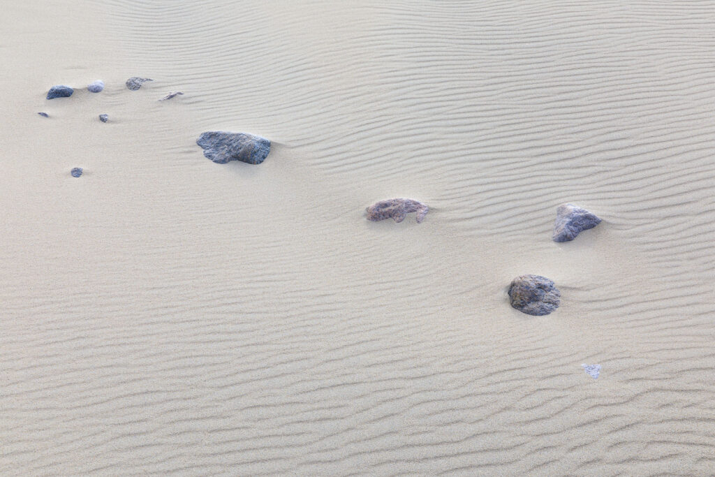 small rocks in arctic sand