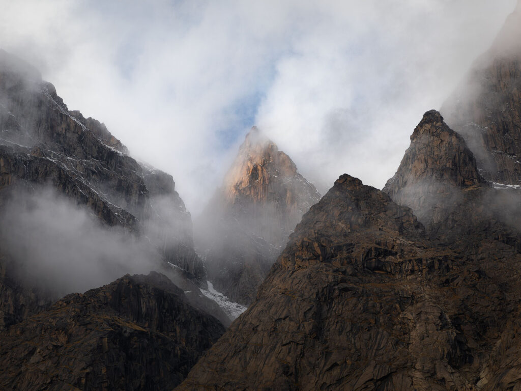 clouds mountain spires on Baffin Island